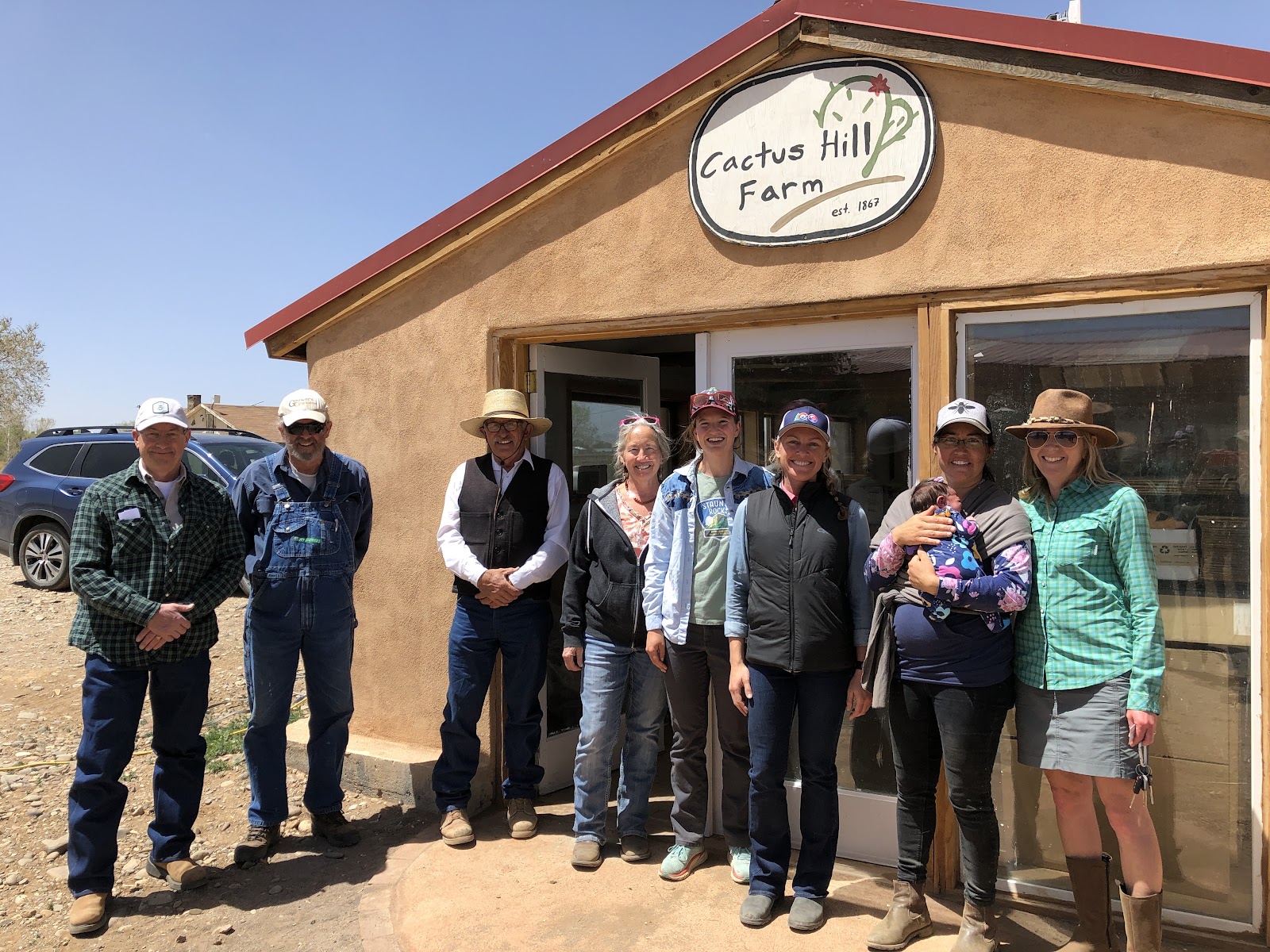 Group outside Cactus Hill Farm building