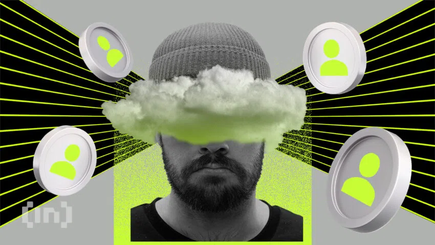 Man sieht einen Mann Hals aufwärts mit einer Wolke vor den Augen und Münzen um ihn mit einem Personen-Avatar. Es geht um SBTs oder Soulbound Token - Ein Bild von BeInCrypto.com.