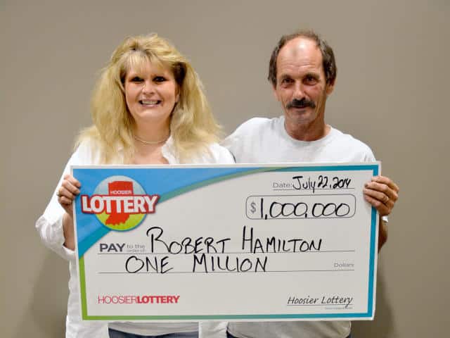 Robert Hamilton after winning a lottery of $1M
