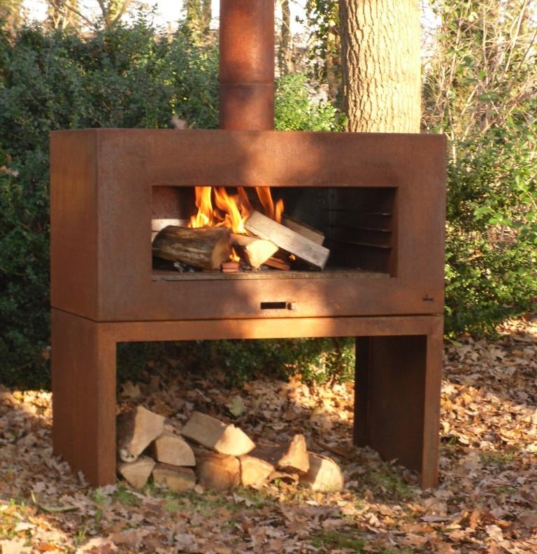 A picture containing tree, outdoor, nature, fireplace</p>
<p>Description automatically generated