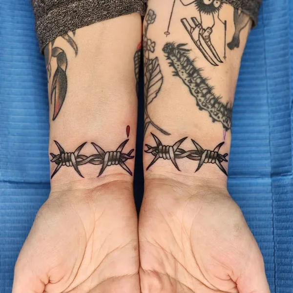 wrist barbed wire tattoo