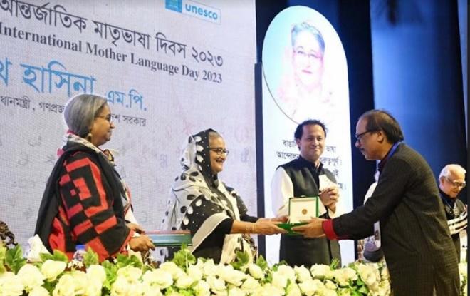 Prime Minister Hasina honours Dr. Mahendra Mishra with the International  Mother Language Award in Dhaka |