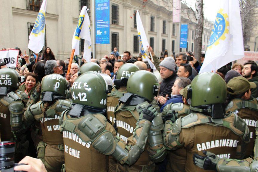 Police contain a protest in Chile