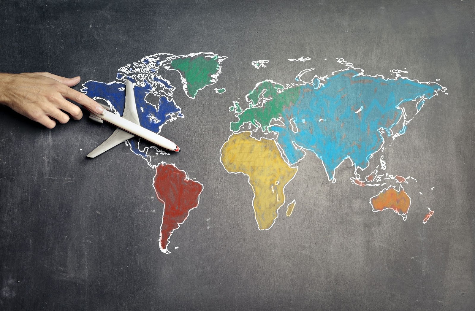Picture of the world map on a blackboard.