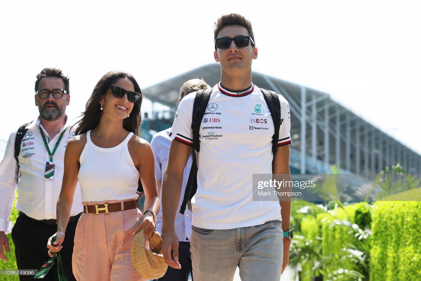 D:\Documenti\posts\posts\Miami\New folder\donne\donne piloti\george-russell-of-great-britain-and-mercedes-walks-in-the-paddock-picture-id1395749086.jpg