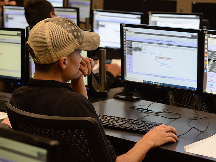 Student working on a desktop computer