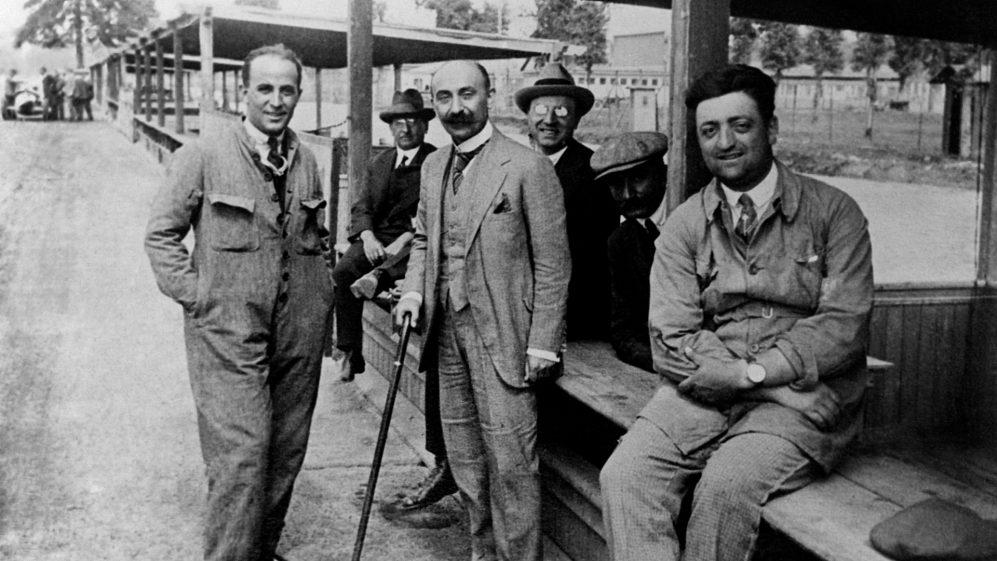 C:\Users\Valerio\Desktop\Enzo Ferrari (R) with Nicola Romeo (M) and Giuseppe Morosi (L) in Monza 1923.jpg