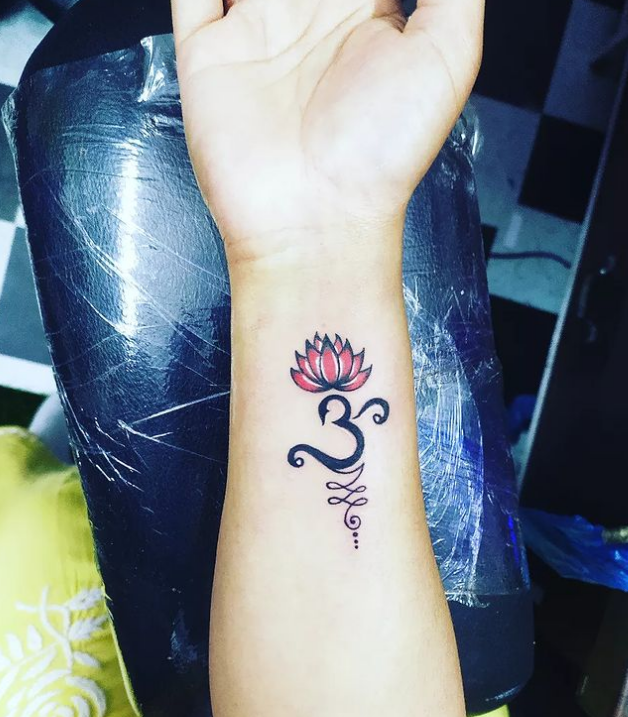 Om Tattoo With Flower Design
