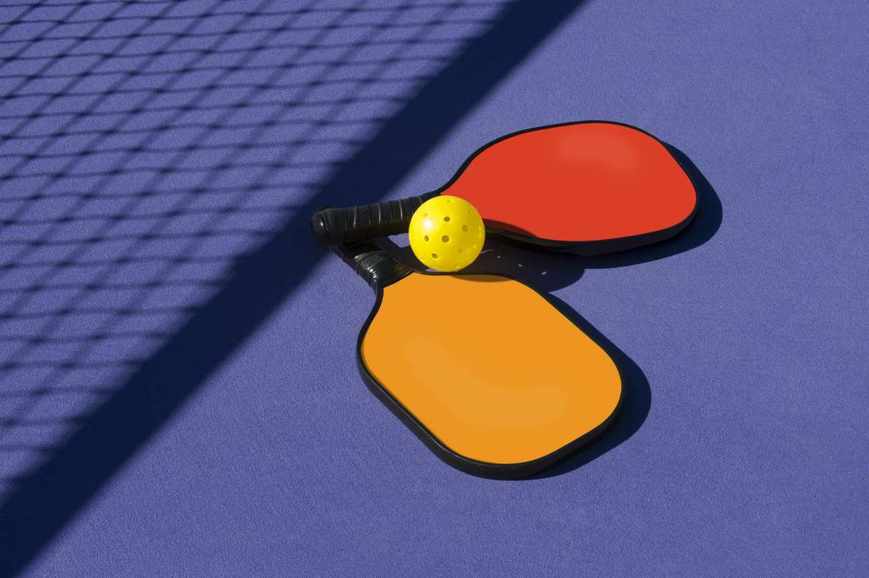 Pickleball court and racquets shown in Las Vegas, Nevada