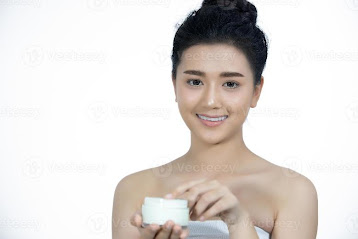 A beautiful woman asian using a skin care product, moisturizer or lotion  taking care of her dry complexion. Moisturizing cream in female hands .  3543699 Stock Photo at Vecteezy