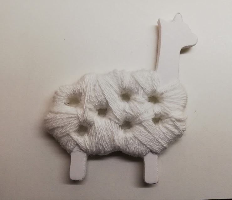 Llama toy that can be wrapped around with wool to make a fluffy llama