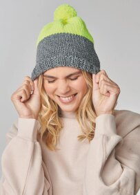 woman wearing a two toned knit hat 