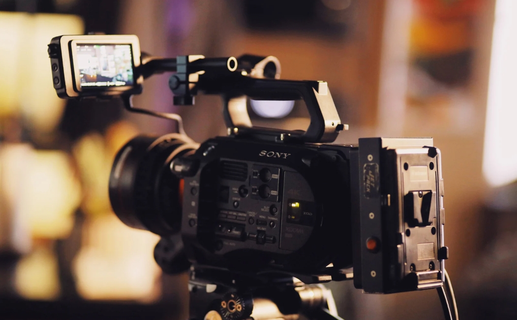 an image showing a video camera used to film a digital marketing video