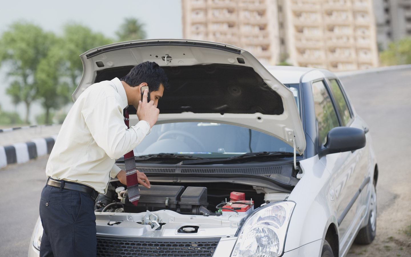 man check car's engine