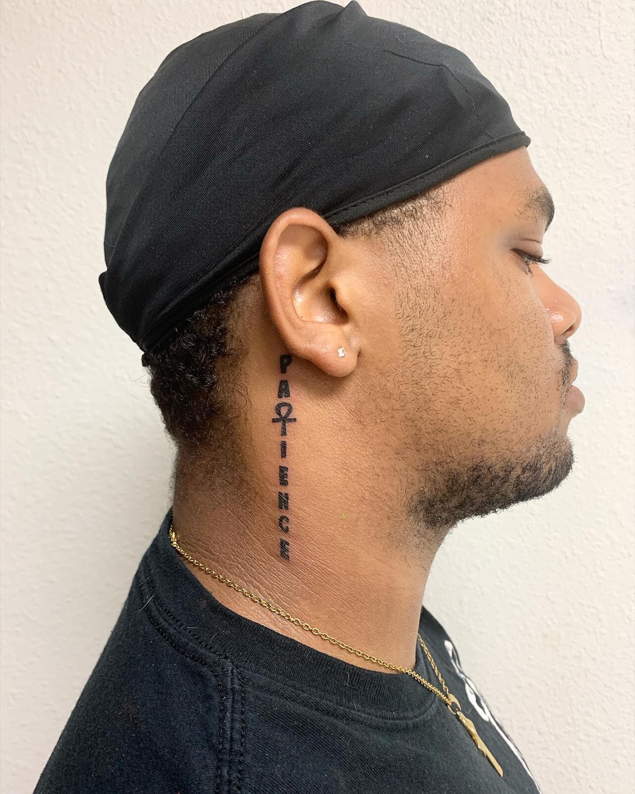 Patience Behind The Ear Tattoo