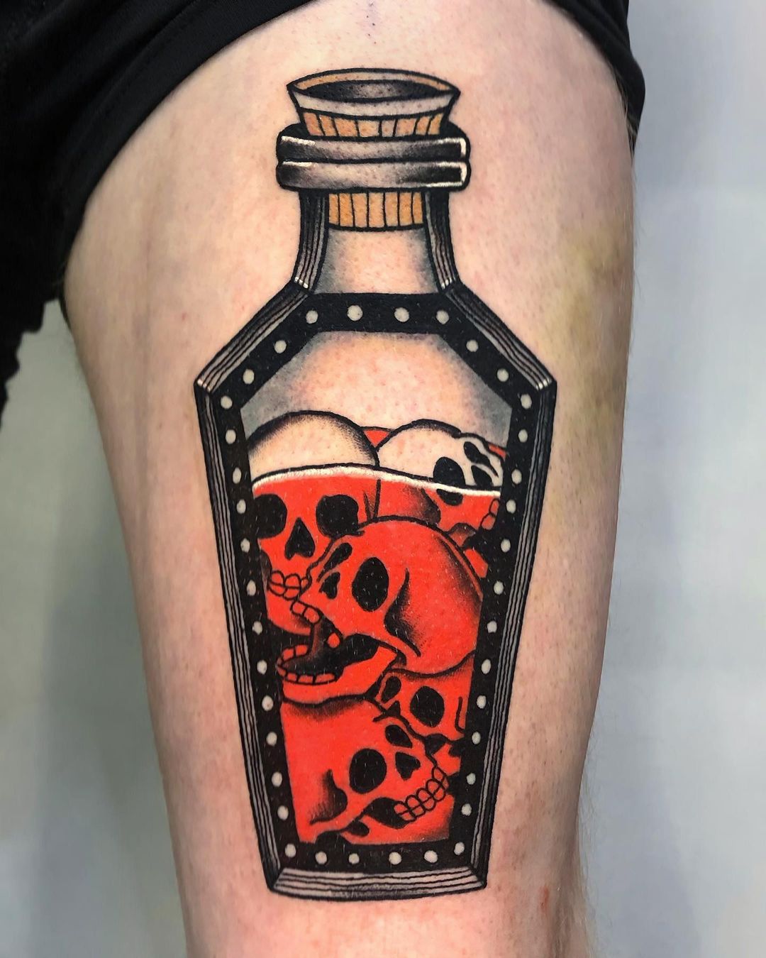 Skulls In Bottle Tattoo