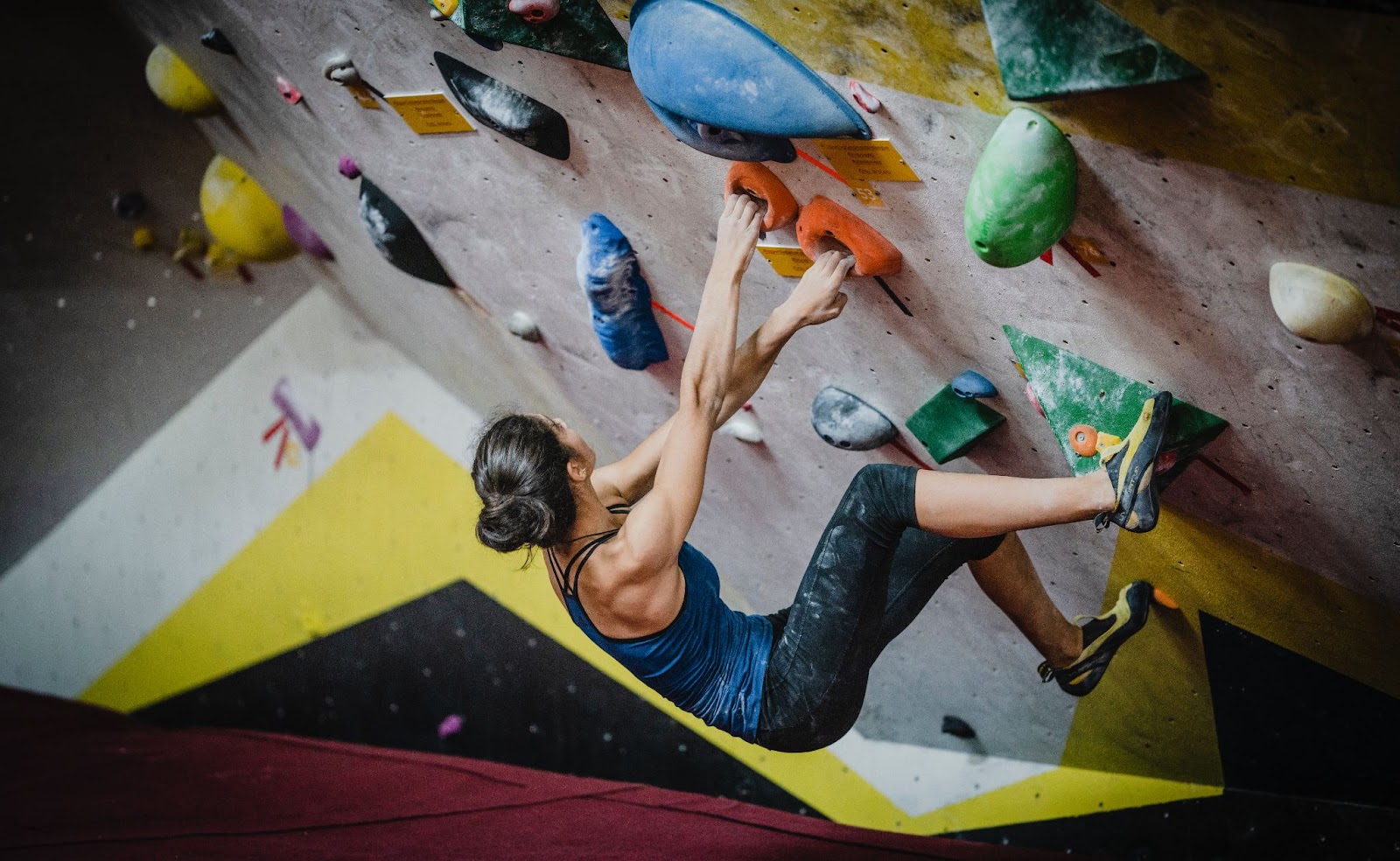 Person climbing at an indoor gym