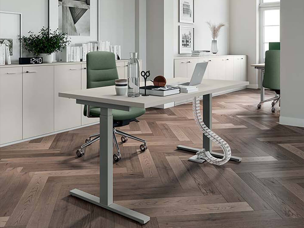 The Fauci height adjustable executive desk represents the epitome of modern office furniture, with a seamless combination of advanced technology and ergonomic design.