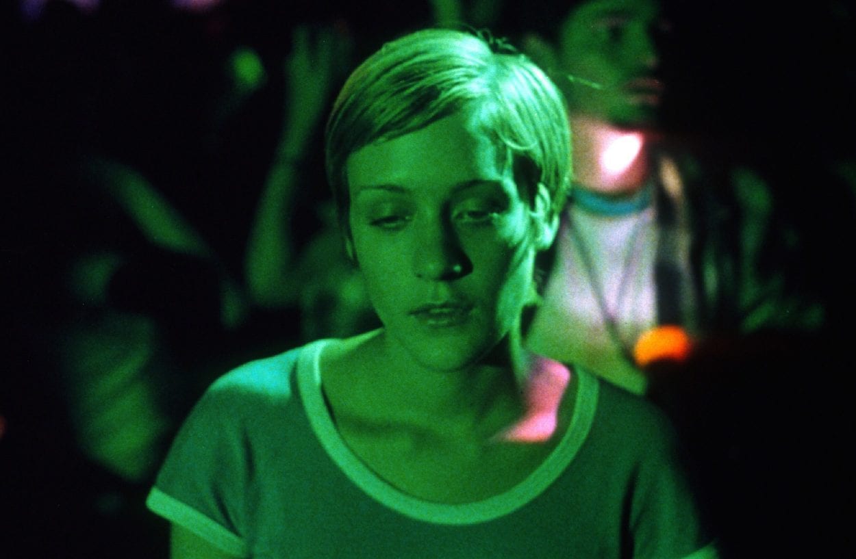 Jennie at a club drugged up and bathed in green light in Larry Clark's Kids