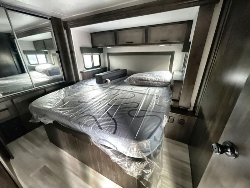 bedroom in the Coachman Leprechaun class C motorhome