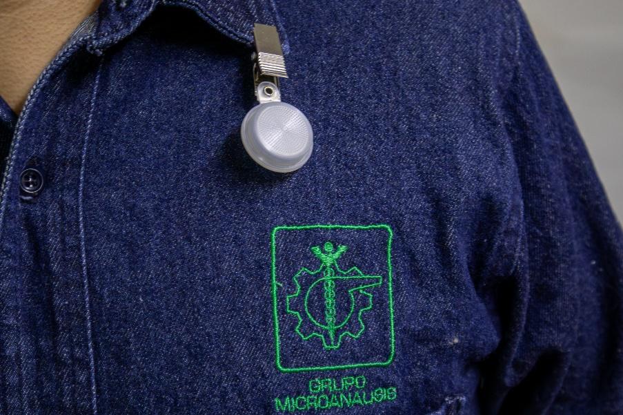 A close-up of a badge

Description automatically generated