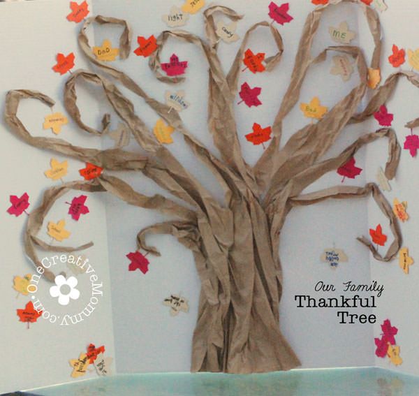 a paper thankful tree decorated with notes of gratitude