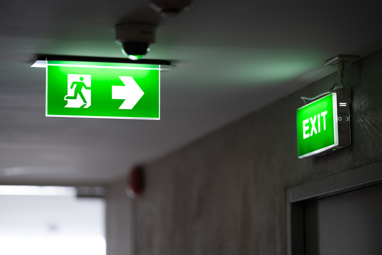 emergency exit signs light up in green