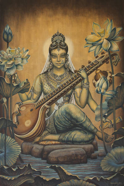 This magnificent artwork depicts Saraswati playing the Veena while seated on a rock. She is wearing stunning gold jewelry and a gorgeous headpiece in a beautiful blue sari with intricate details. 