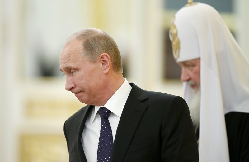 Владімір Путін та Патріарх Кіріл під час засідання ради РПЦ в Кремлі.