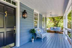 Alt-tag: A front porch with a seating area.