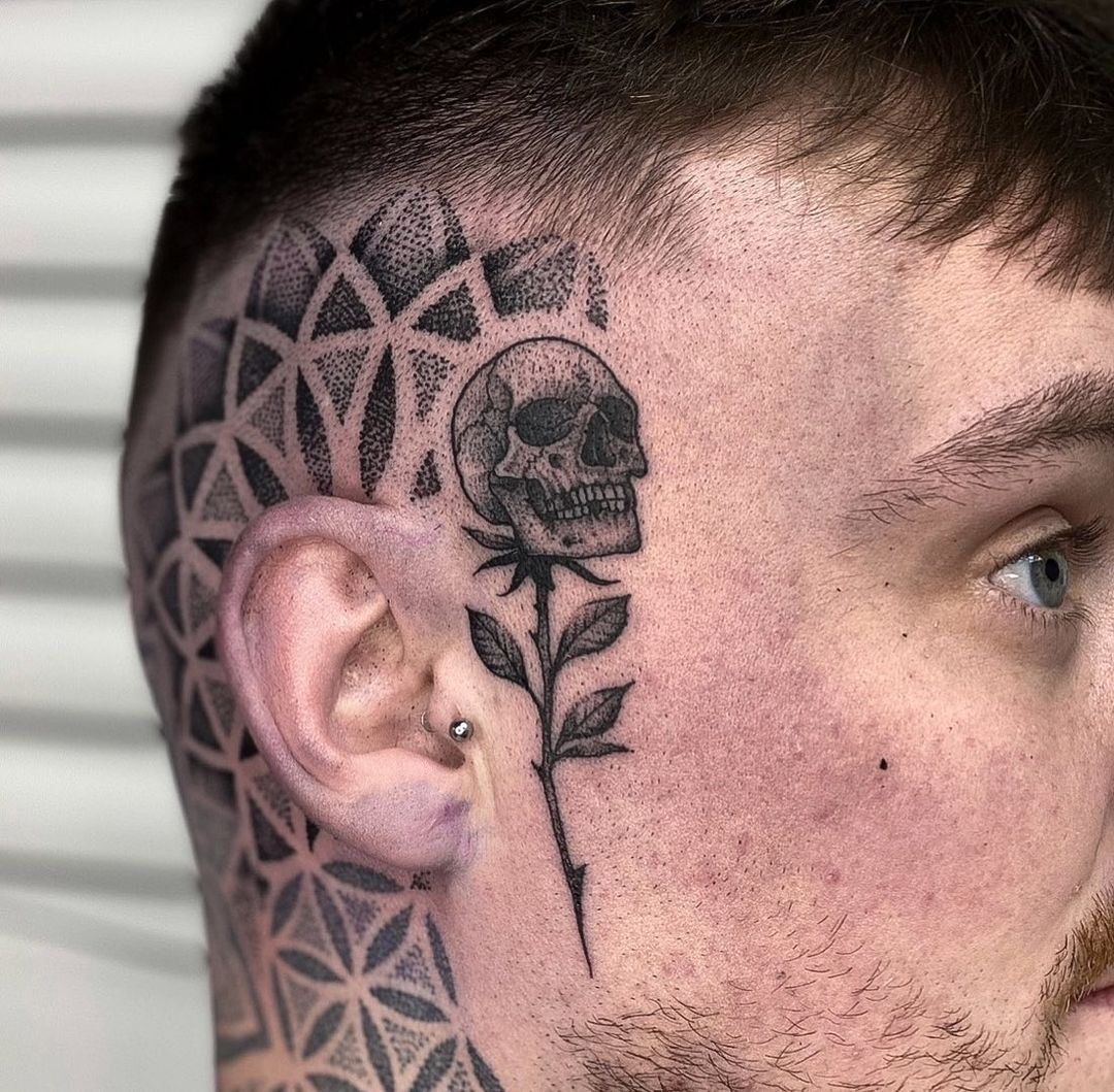 skull on stem tattoo