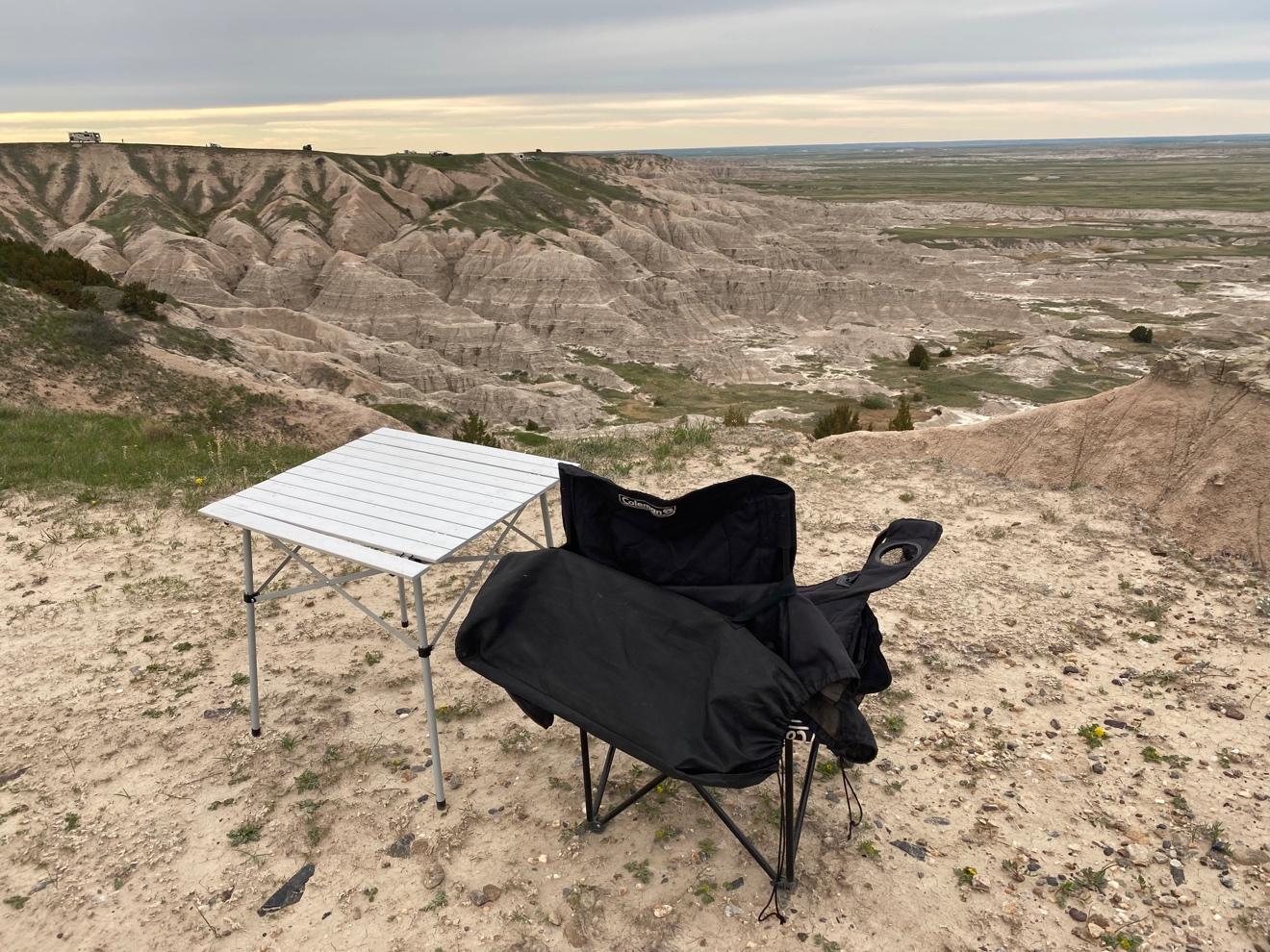 A chair and table on a beach

Description automatically generated with low confidence