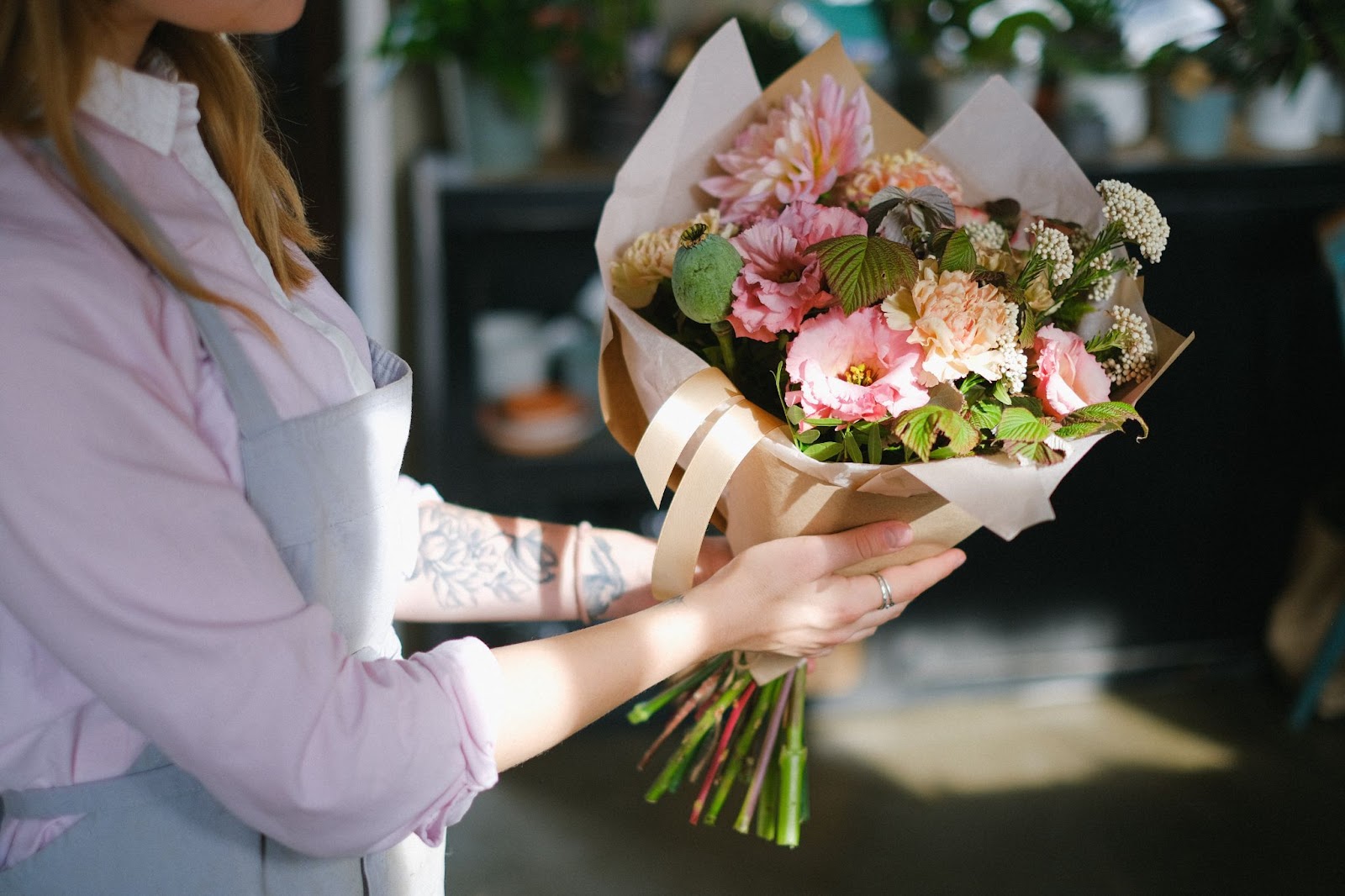 Florist preparing a flower bouquet for a fundraiser