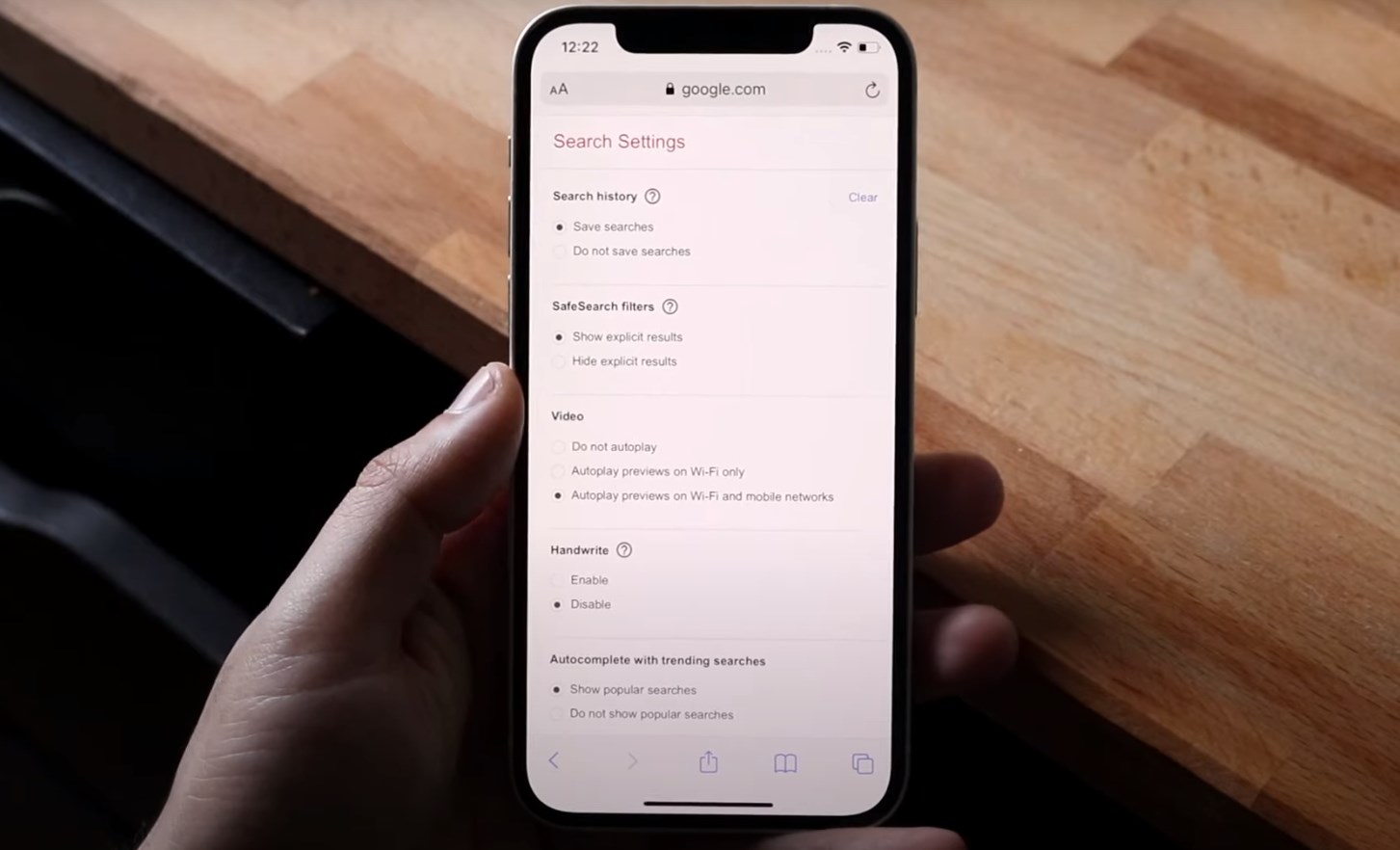 Google’s Search Settings on the iPhone screen