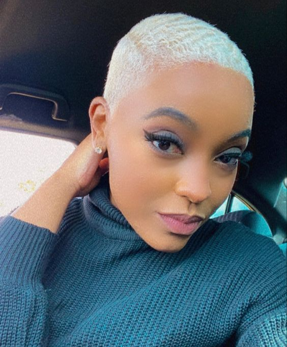 a beautiful lady rocking blonde low cut