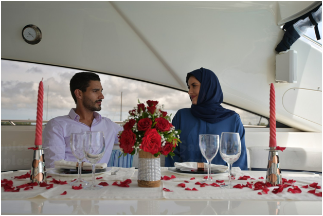 A group of people sitting at a table

Description automatically generated
