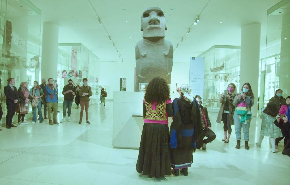 A group of people in a museum</p> <p>Description automatically generated with medium confidence