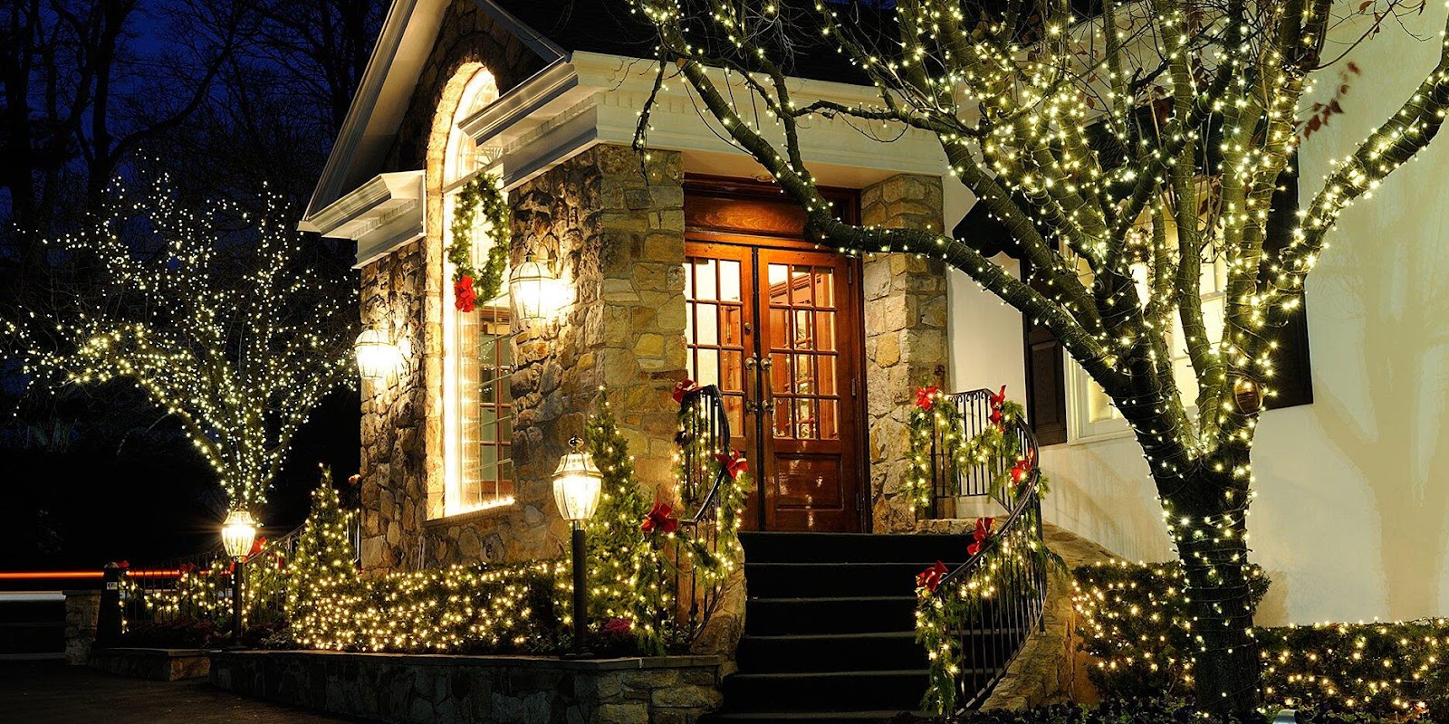 WeServe, the outside of a house decorated with christmas lights for the holiday