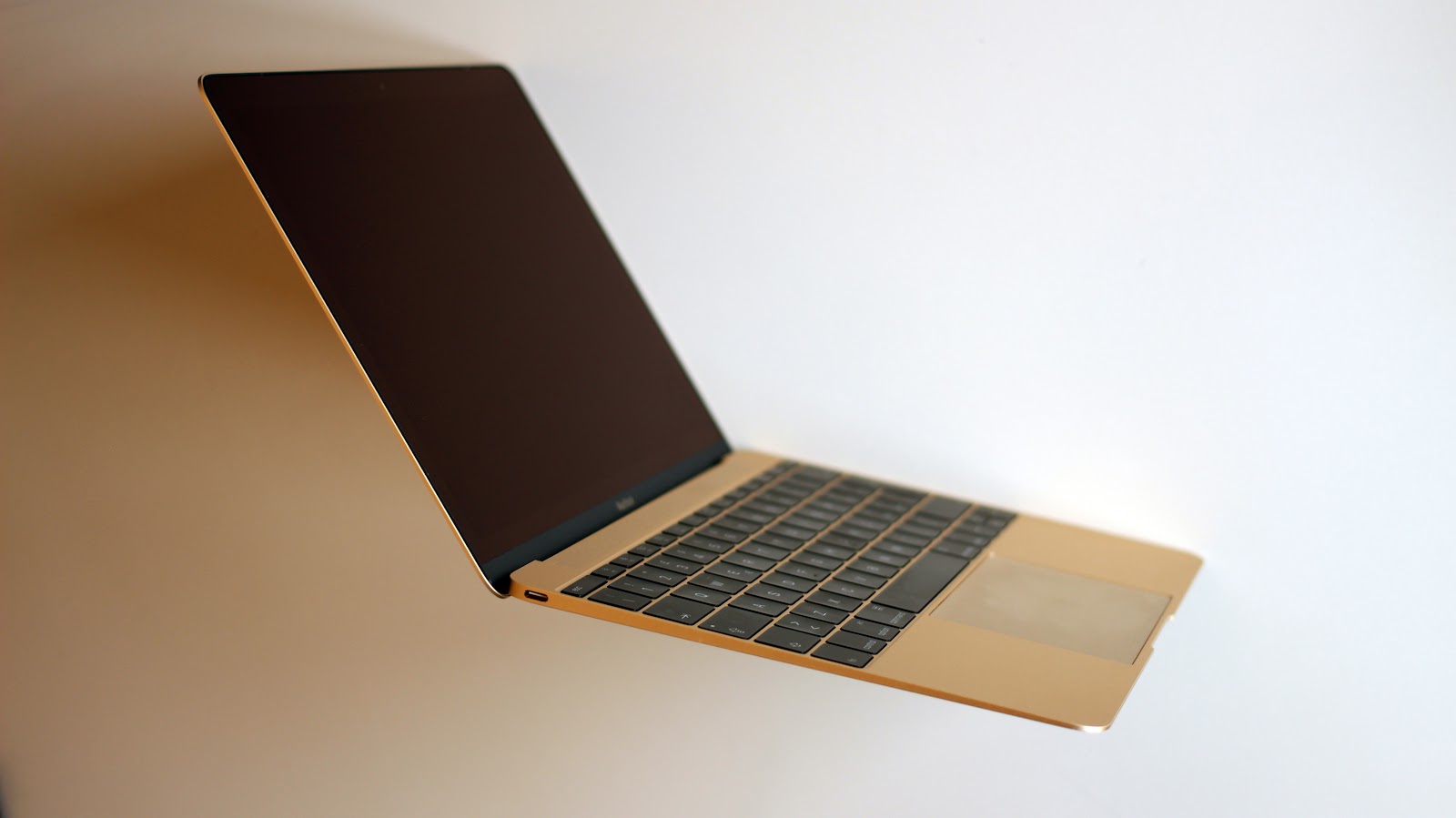 This image shows the MacBook Air in the shade full scene.