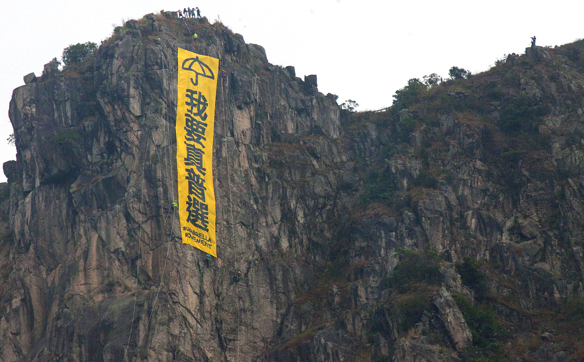 Pro-democracy banner hung from Lion Rock has officials scrambling | South  China Morning Post