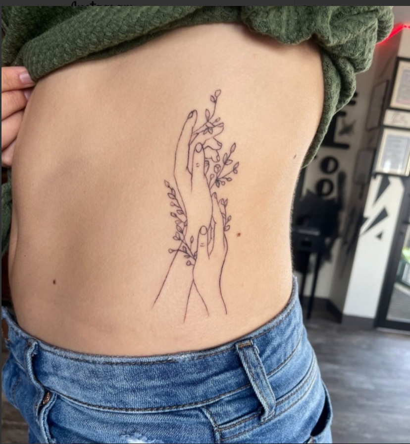 Flower Themed Rib Tattoos 33