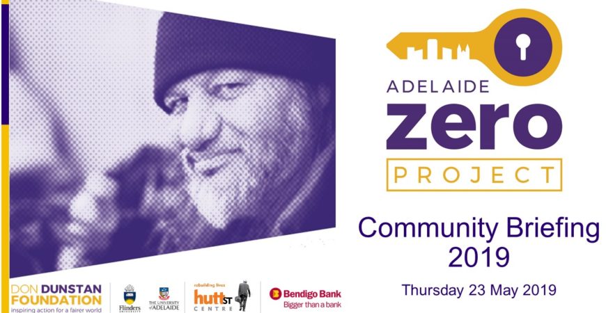 The introductory slide for the Adelaide Zero Project Community Briefing for 2019. On the left is a stylised photograph of a bearded man experiencing homelessness, smiling at the camera.