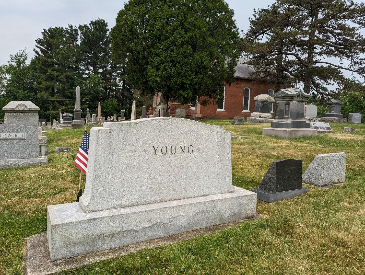 A gravestone in a cemetery

Description automatically generated with low confidence