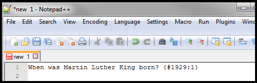 Notepad file with the following text:
When was Martin Luther King born? {#1929:1}
