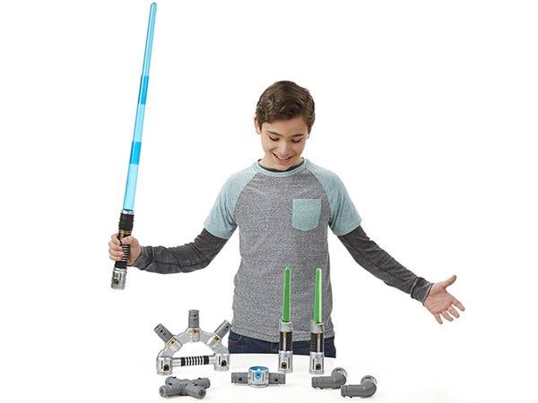 A child using a lightsaber toy - Star Wars gifts