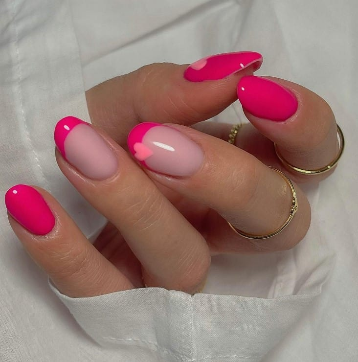 Lady rocks the beautiful hot pink look a perfect  sample of a cute short nail