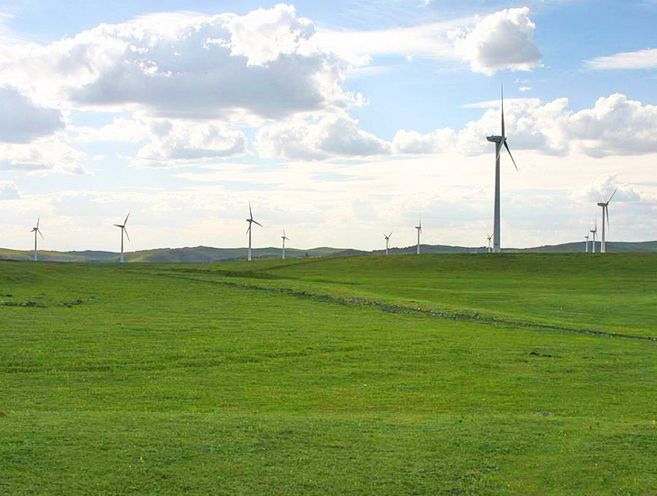 Sunny skies emerge over the Salkhit Wind Farm in Mongolia, where 95 percent of their energy is wind produced