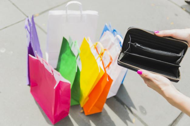 Empty wallet in female hands Free Photo