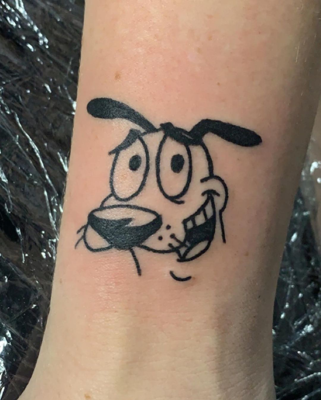 Courage Cowardly Dog Tattoo On Wrist