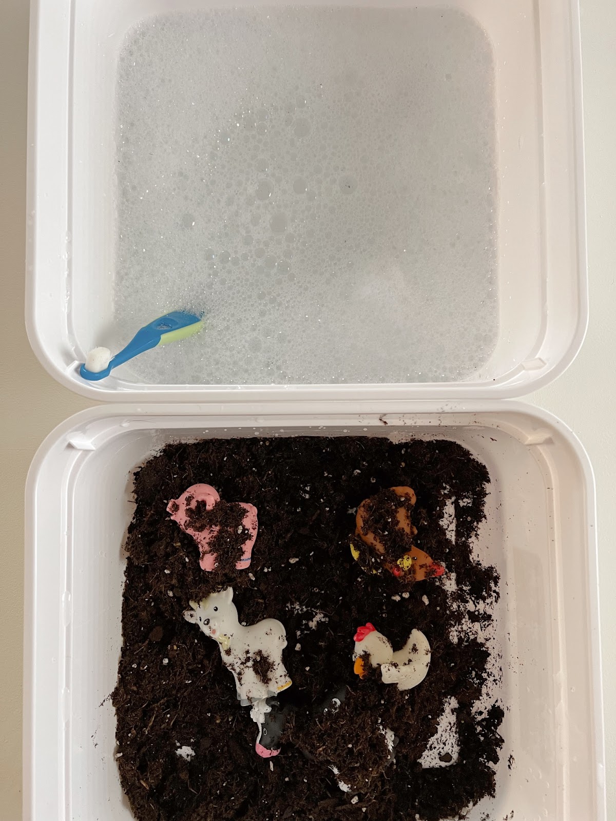 farm animal wash spring sensory bin idea 